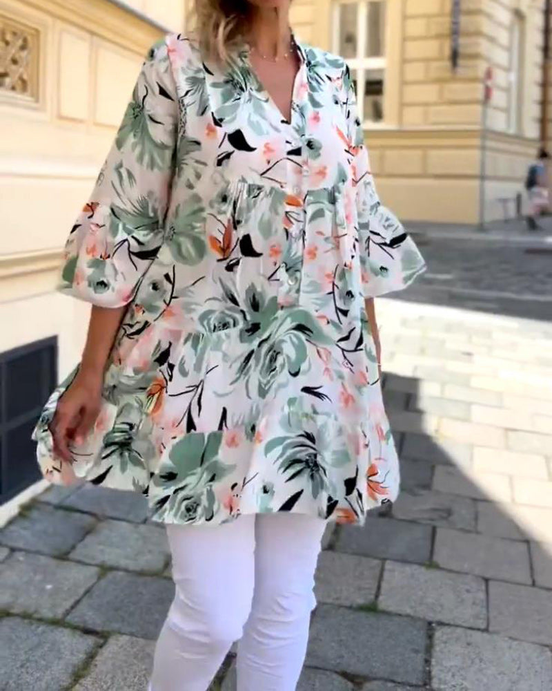 Elegante bluse mit v-ausschnitt und blumendruck